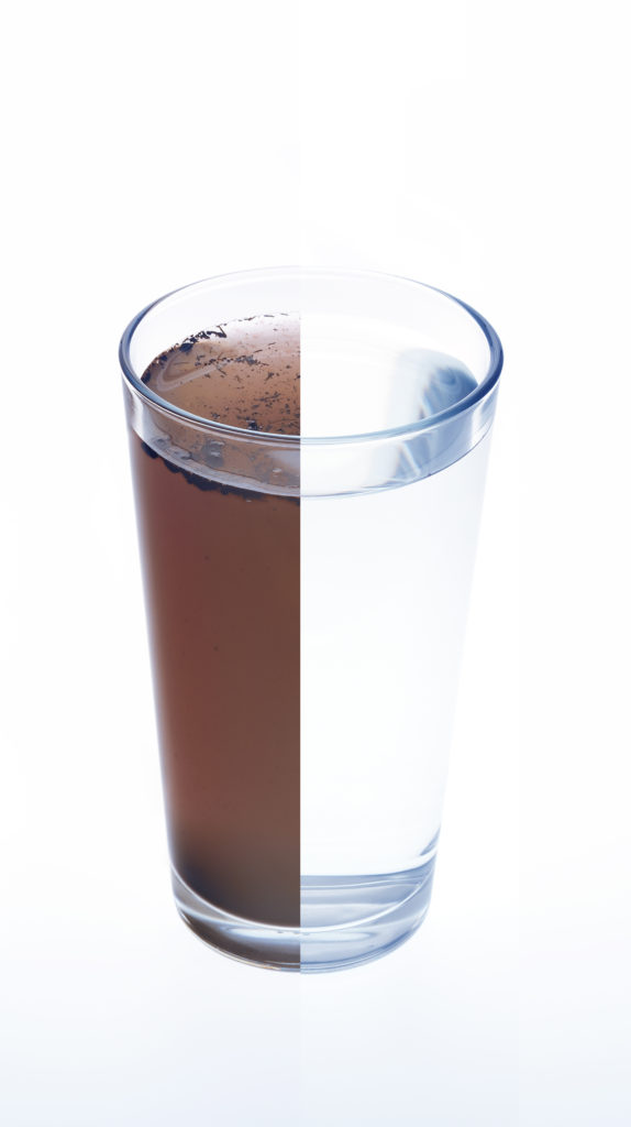 Clean and dirty water in drinking glass - concept